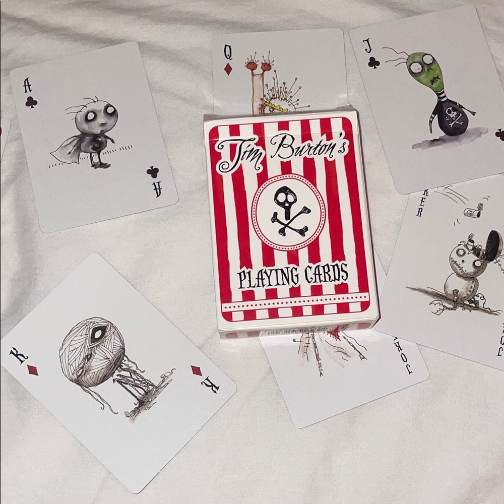 2012 Tim Burton Red and White Striped Playing Cards with Black Skull Motif